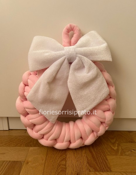 Ghirlanda rosa con fiocco